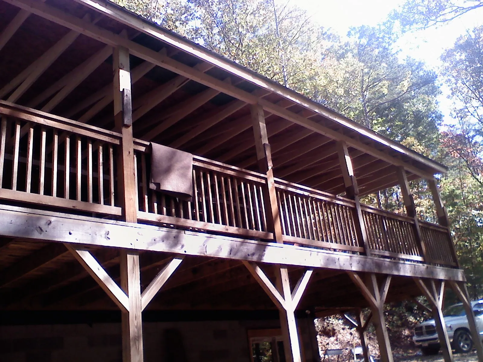 Timber framing under a new elevated porch and deck — Roof Leak Repair in Mattawa by Roofing Brothers